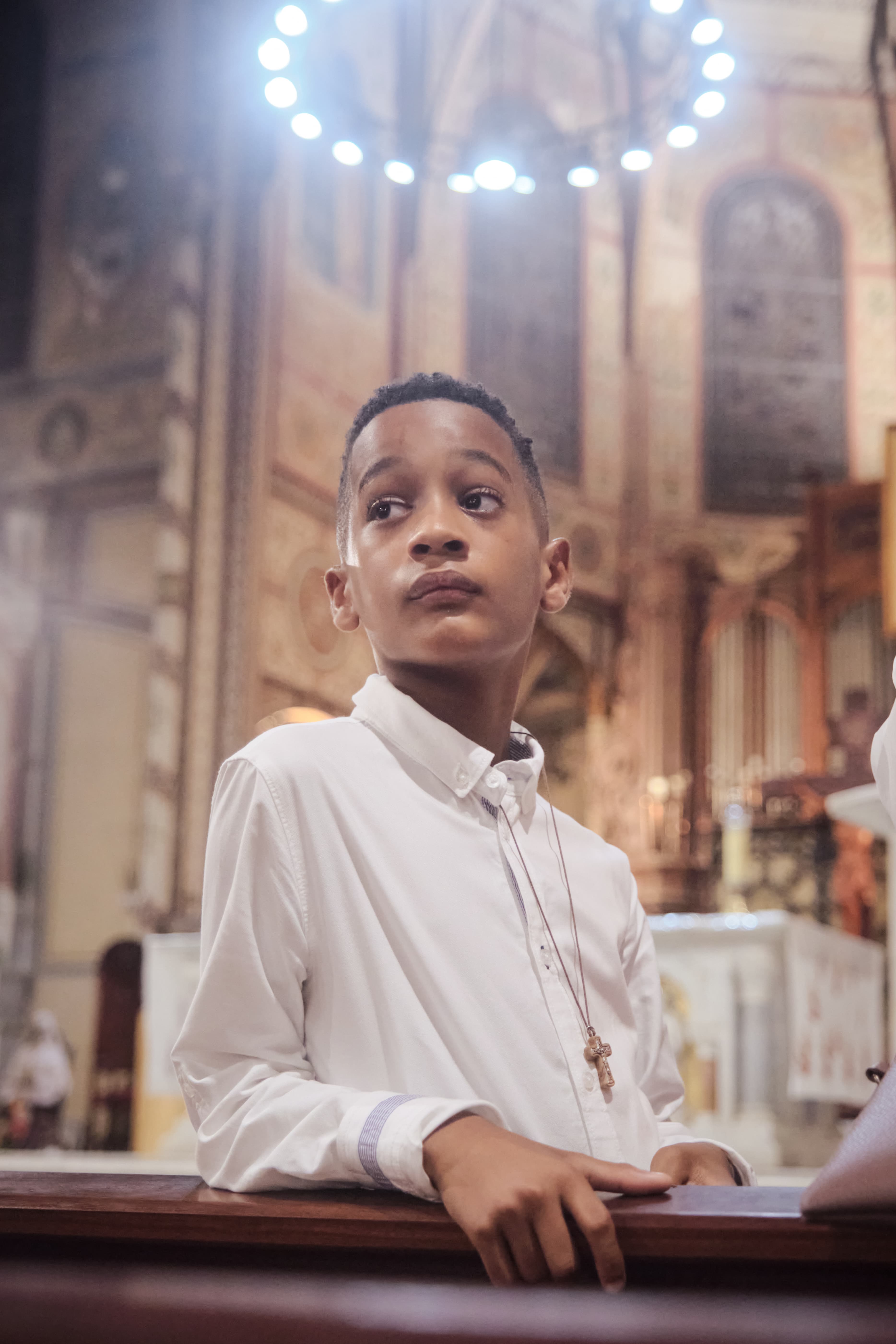 Communion de S. célébrée à l'église, photographiée par SVLR Studio